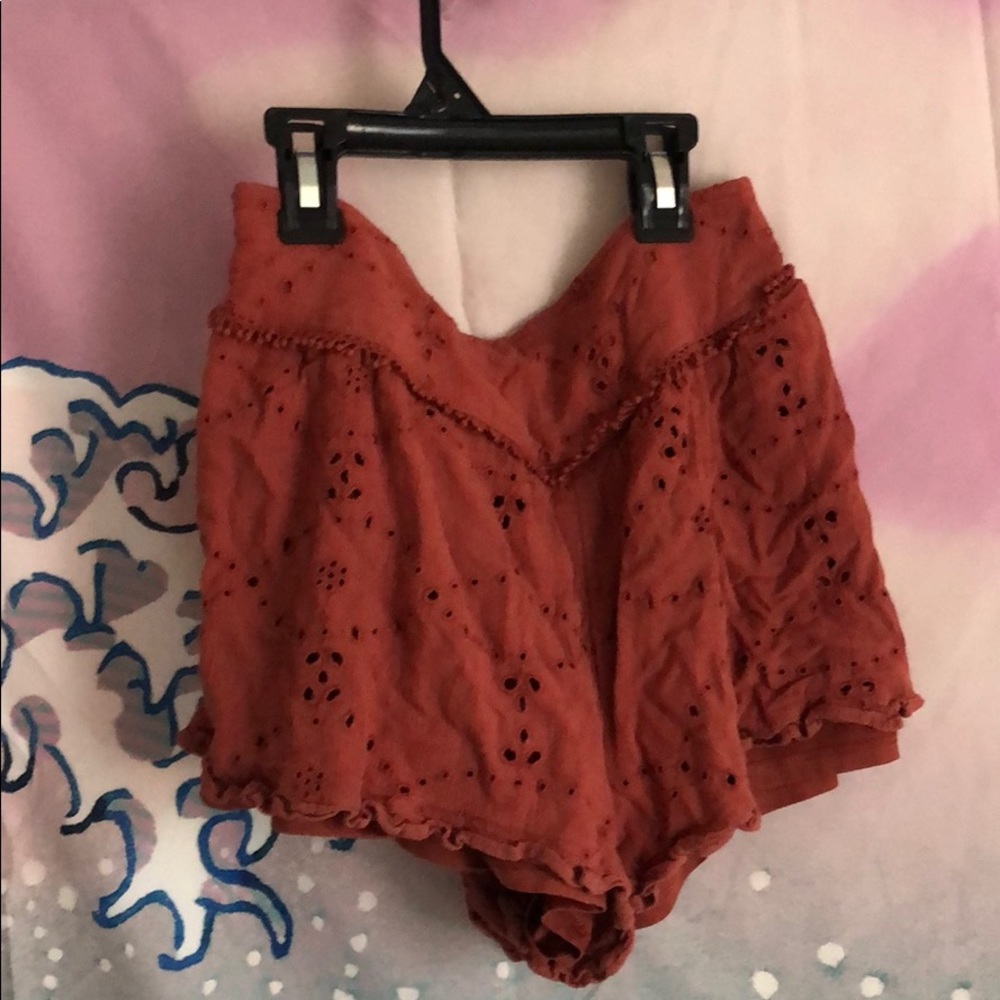 Red flower patterned shorts